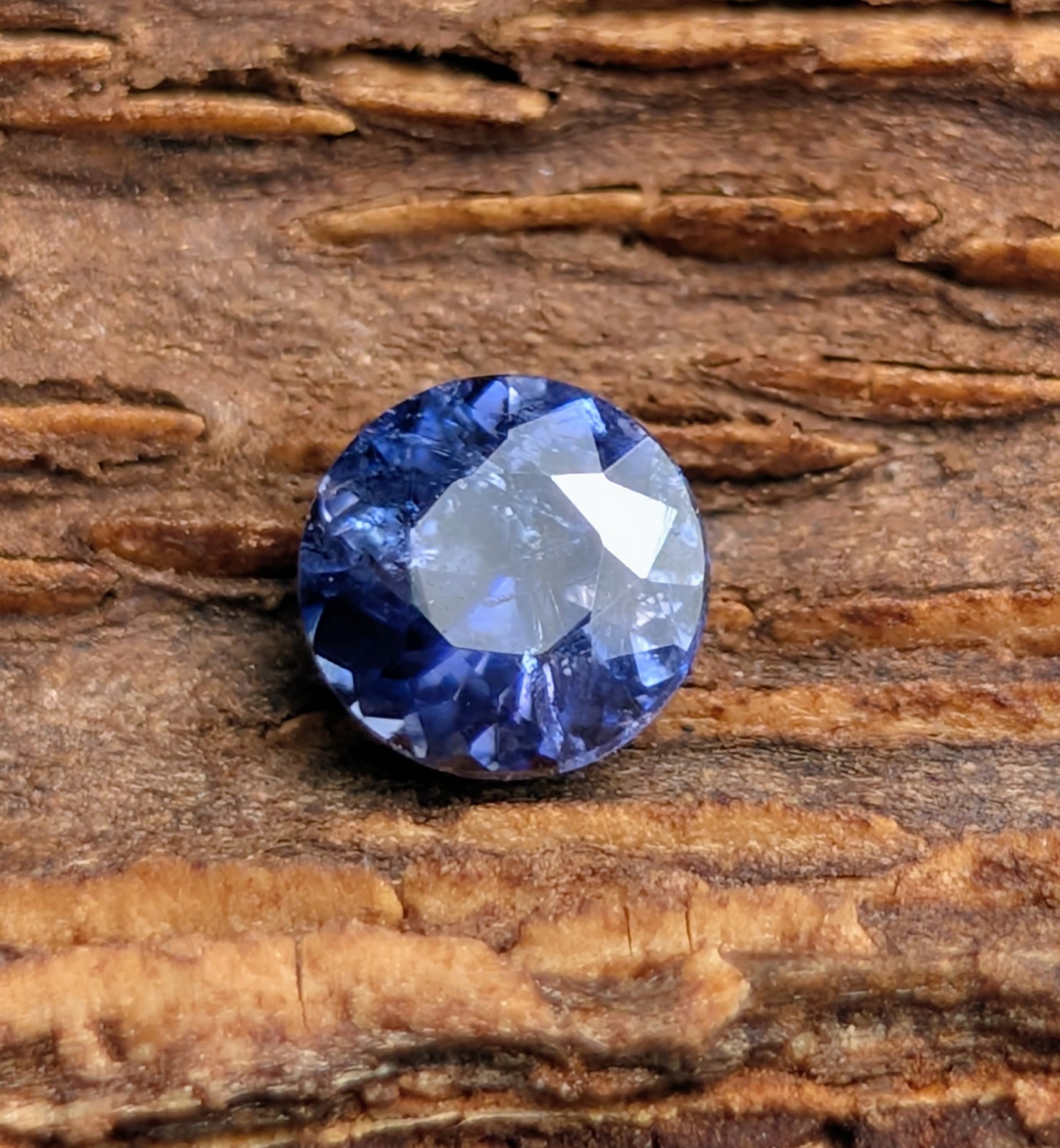 Benitoite: I, round gemstone 0.24 ct
