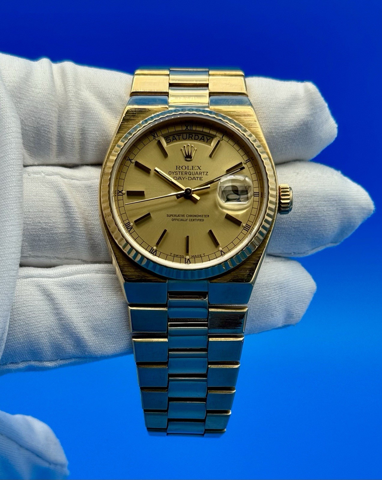 Rolex 19018 President Day Date Oysterquartz 18K Gold 36mm Champagne Dial Watch