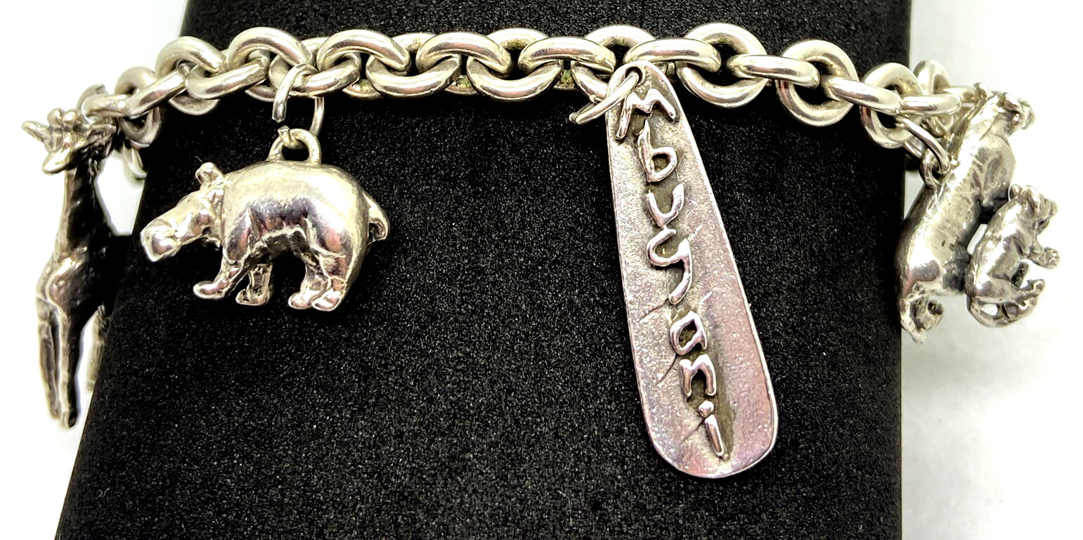 RARE SUSAN CUMMINGS STERLING SILVER (5) AFRICAN ANIMALS MBUGANI CHARM BRACELET