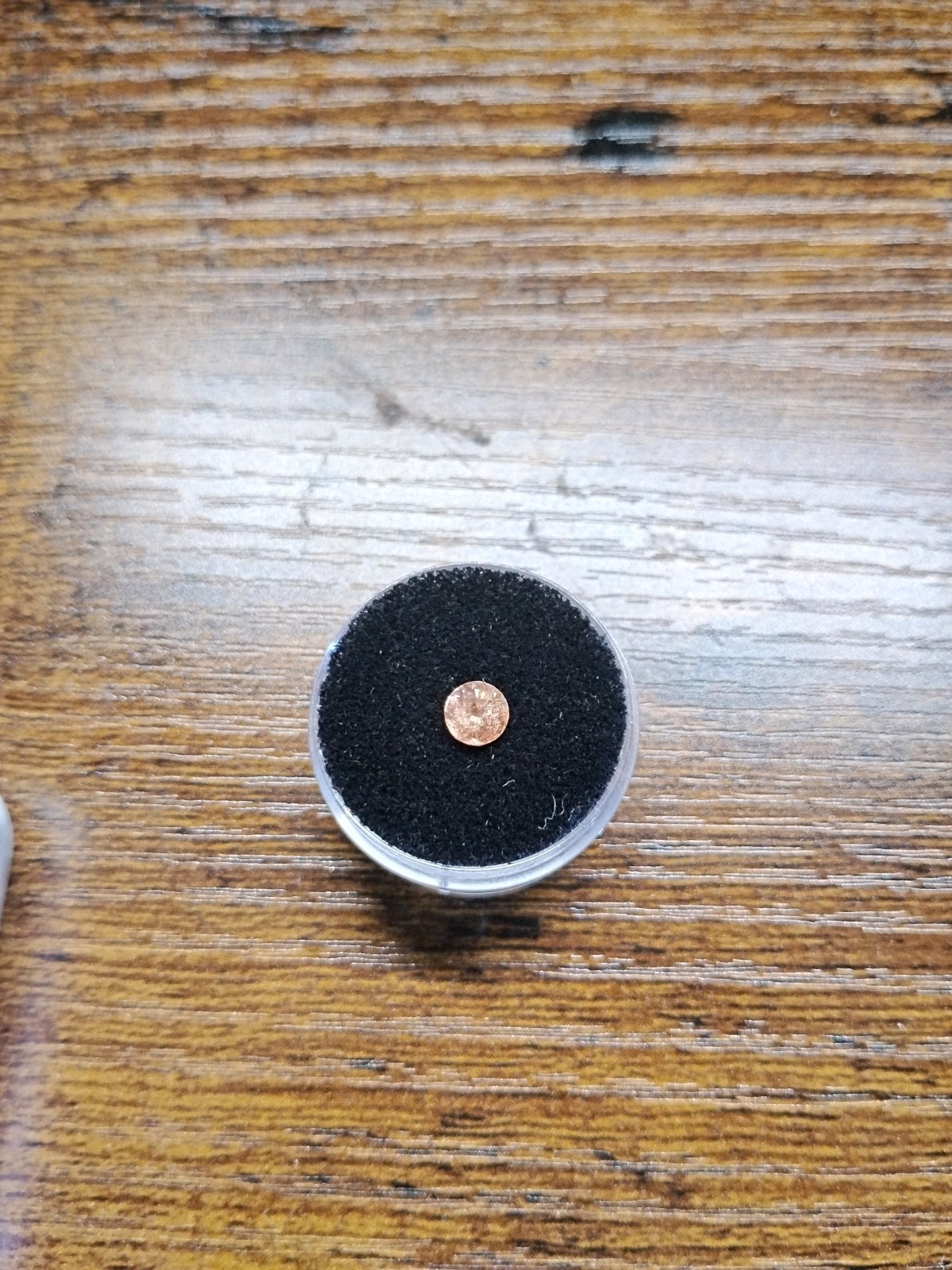 peach schiller faceted Oregon Sunstone 0.80 carat 5.4mm round found & cut in USA