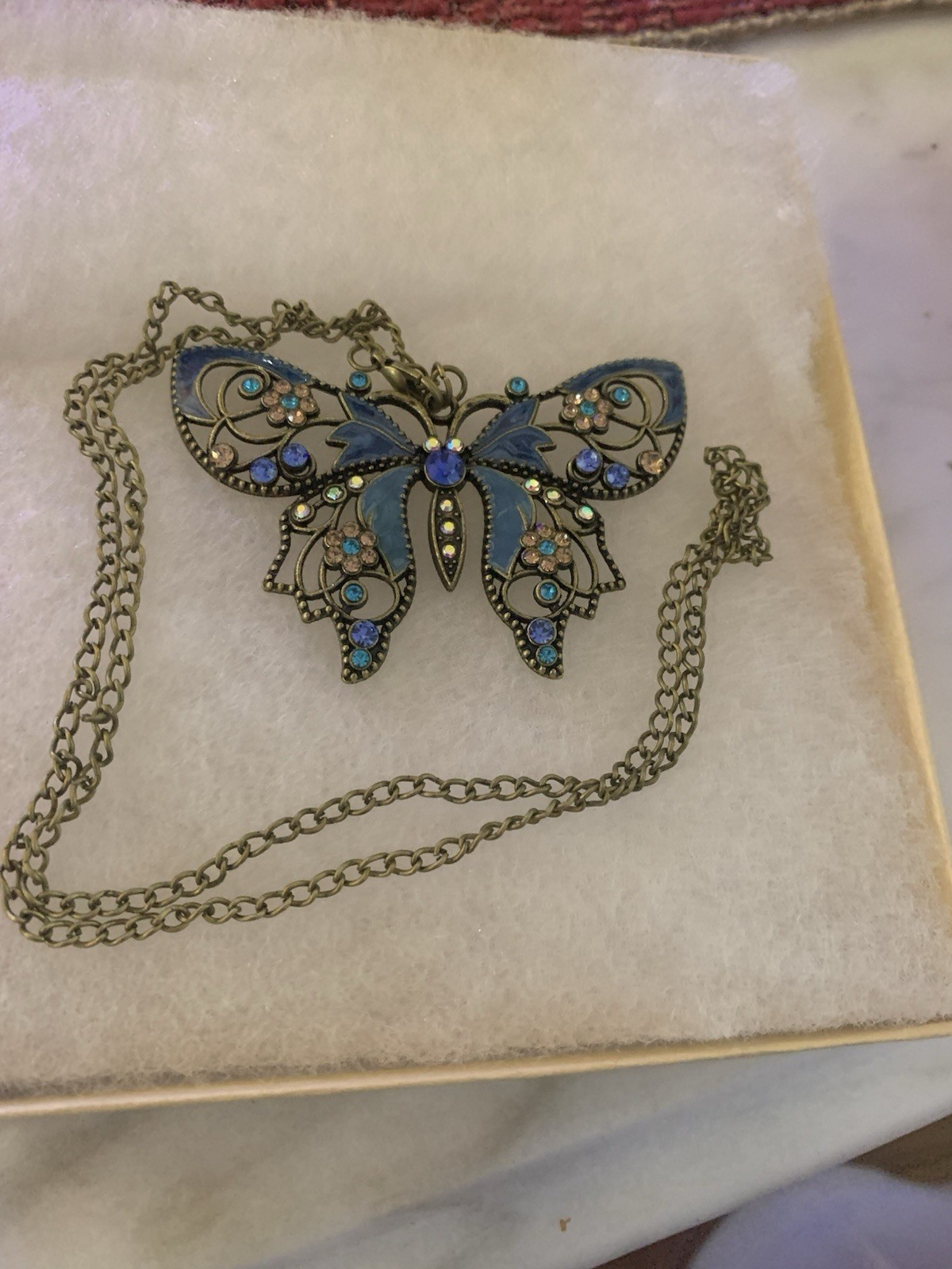 Blue Butterfly Necklace with Many Colorful Stones and An Antique Goldlike Chain