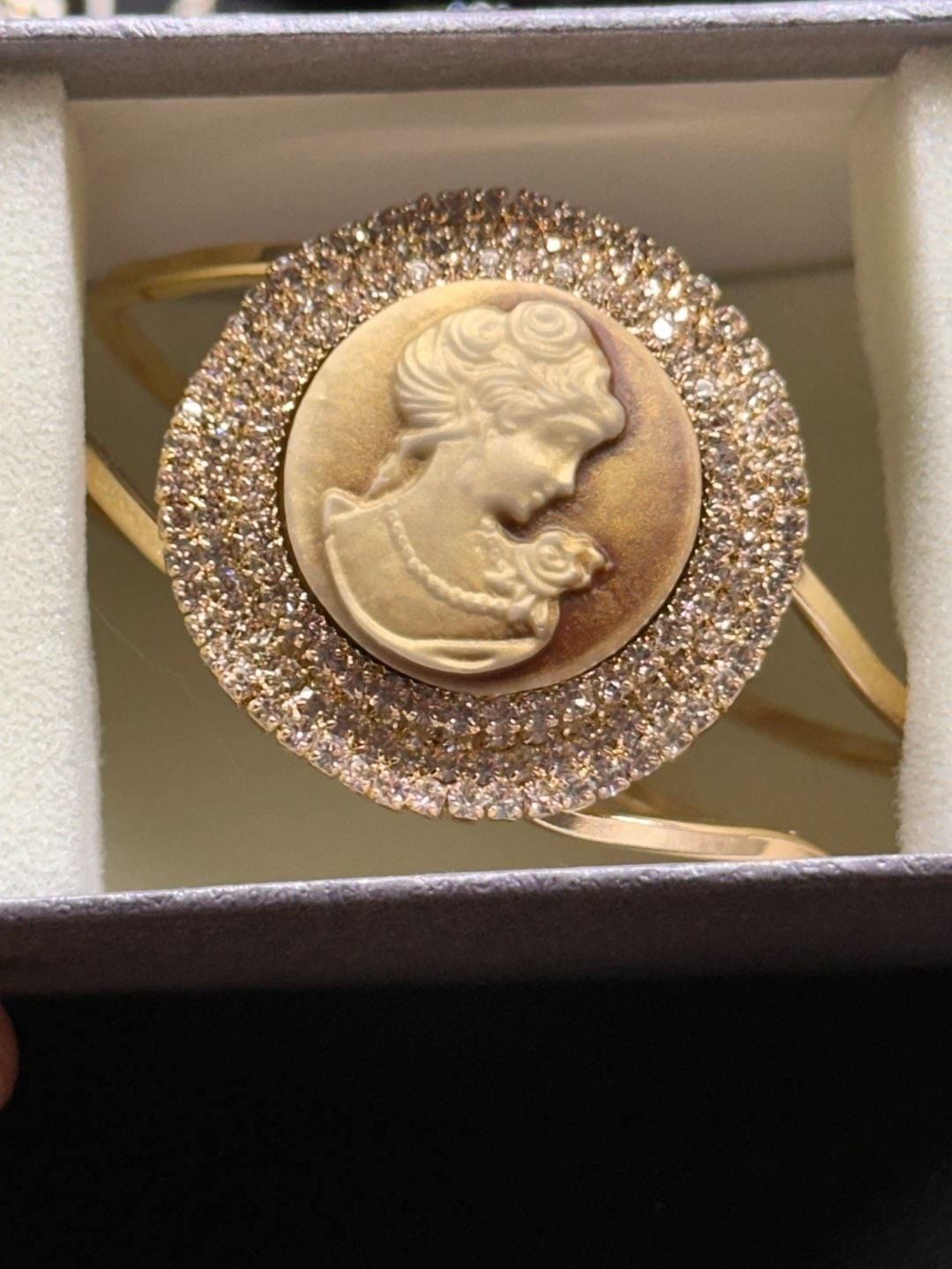 Vintage Inspired Gold Tone Cuff Bracelet with Beige Cameo and Clear Crystal Halo