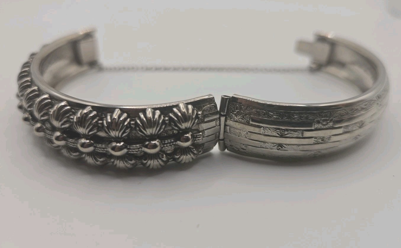 Silver Tone Hinged Bangle Bracelet Ornate And Embossed With Safety Chain 8″