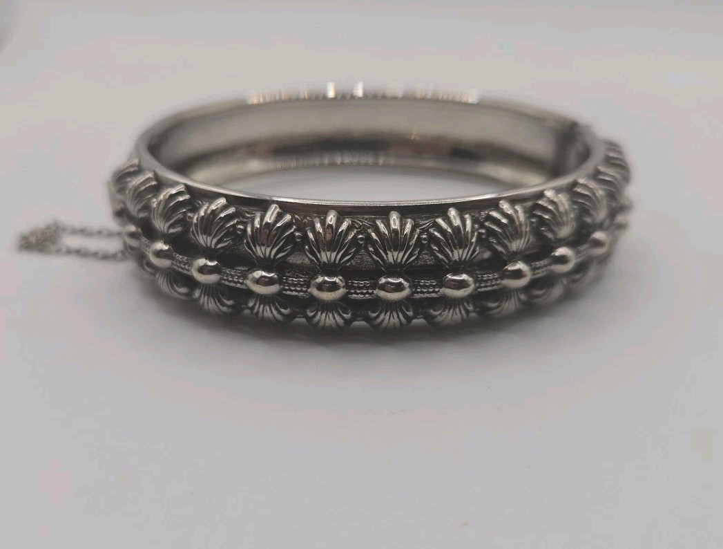 Silver Tone Hinged Bangle Bracelet Ornate And Embossed With Safety Chain 8″