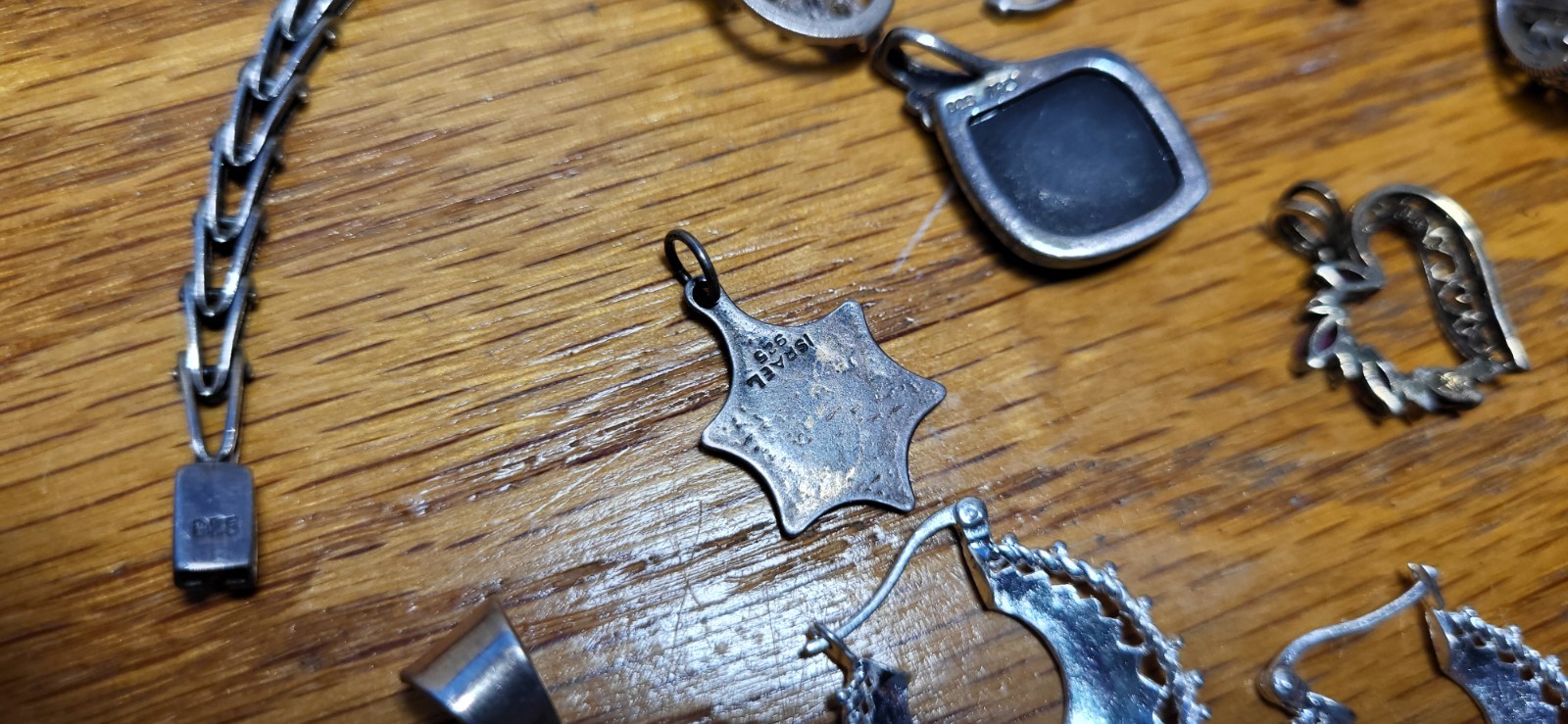 70+grams 22 Pices MARKED 925,SILVER EARRING,PENDANTS, BRACELET.WEARABLE,SELLABLE