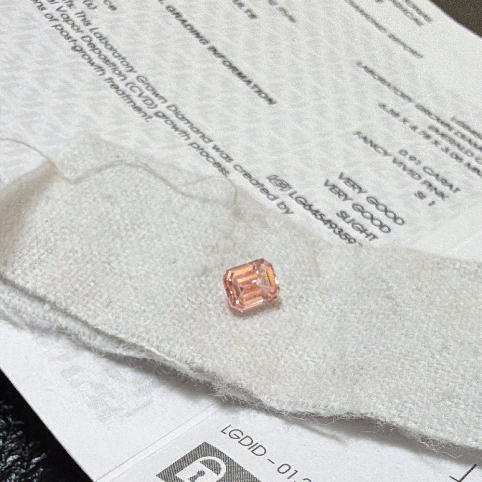 IGI Certified Lab-Grown Emerald Cut Diamond 0.91ct Fancy Vivid Pink SI1