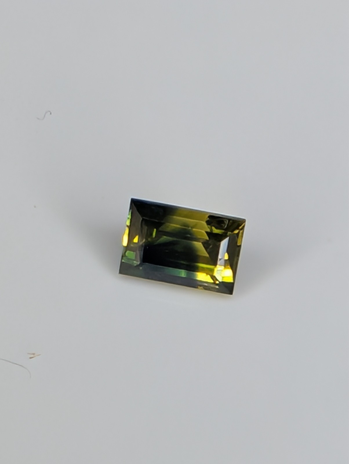 USA seller .63 IF Parti Sapphire faceted gemstone
