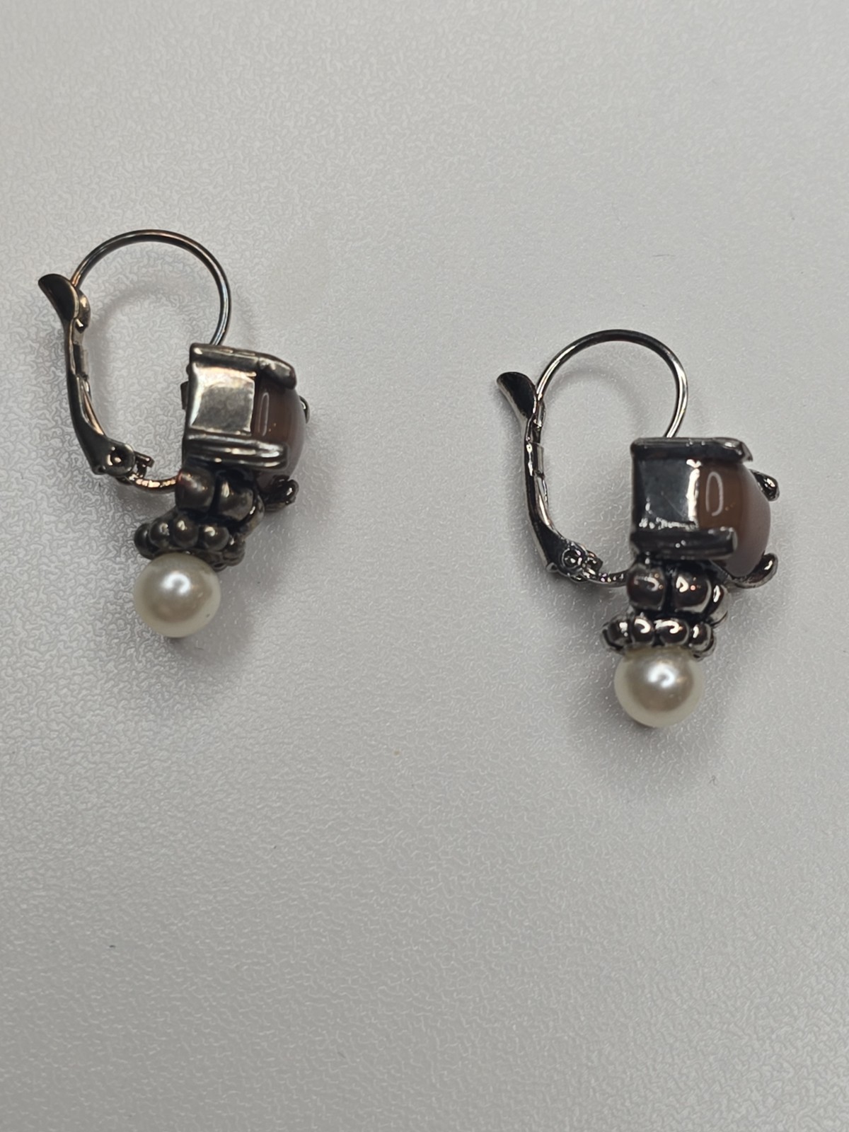 sterling silver Lagos earrings, smoky quartz stone and pearl accent.