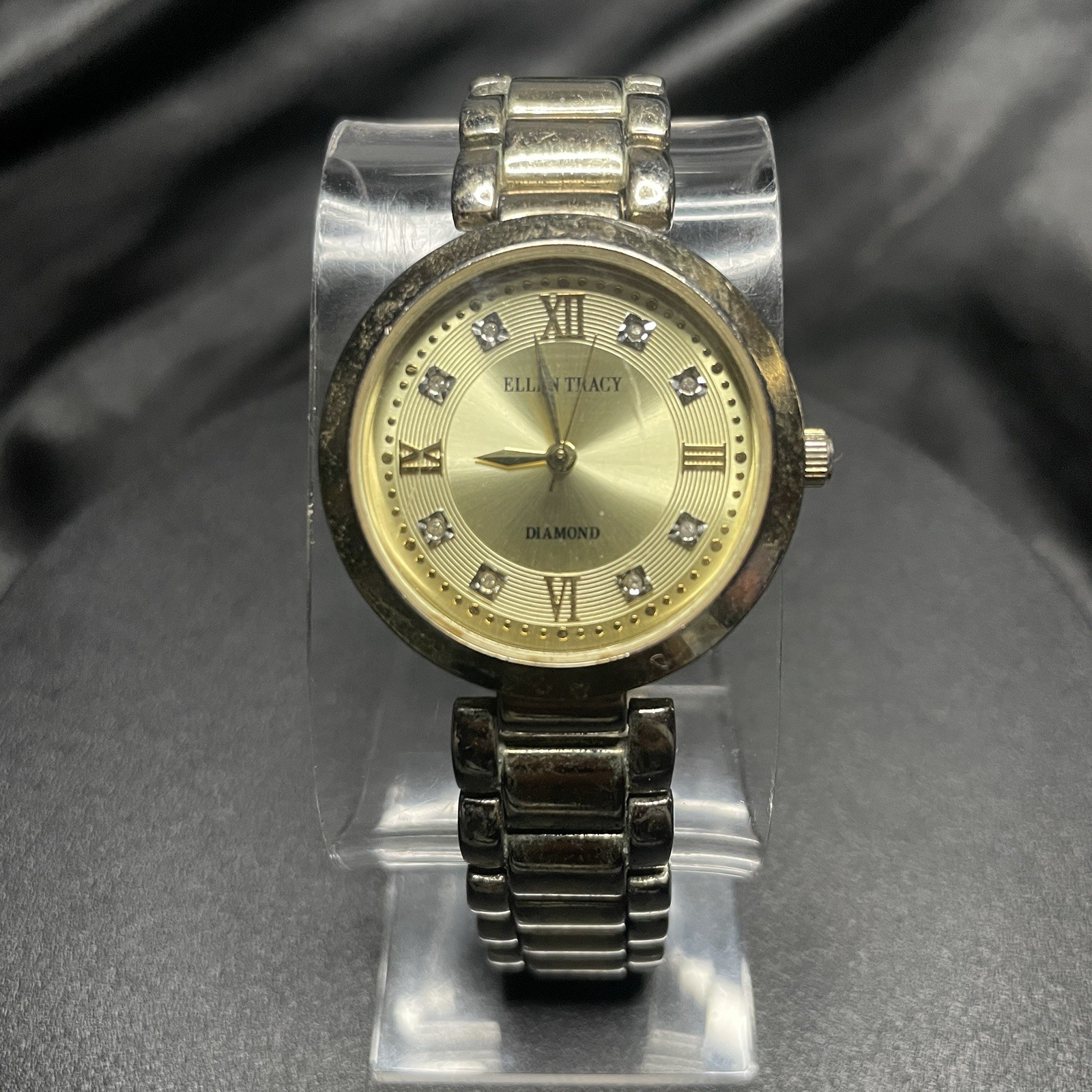 Ellen Tracy Women’s Quartz Watch Gold Dial Diamond Accent Roman Silver Bracelet