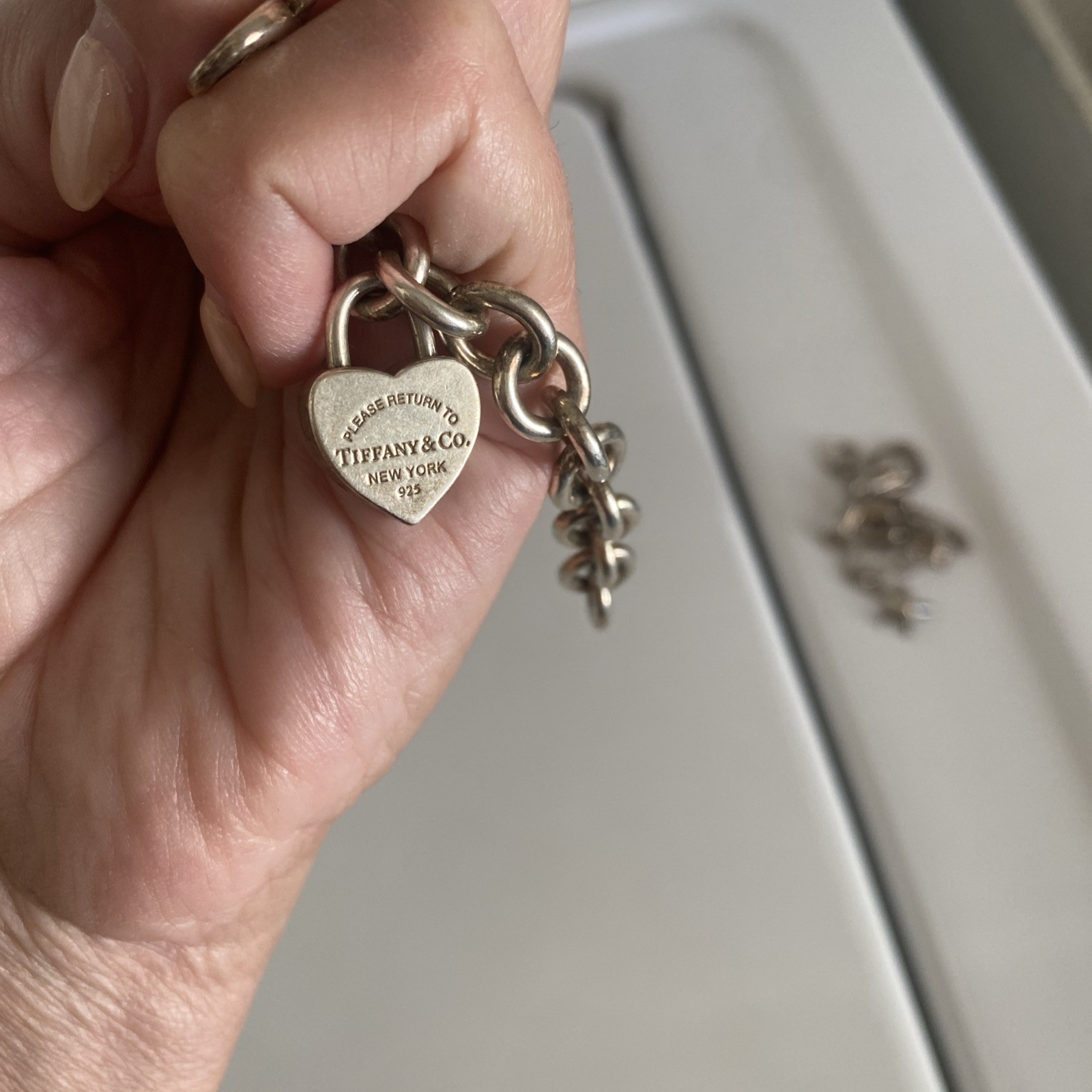 Tiffany & Co. Sterling Silver Charm Bracelet with 2 Charms Length 71/2 Inches