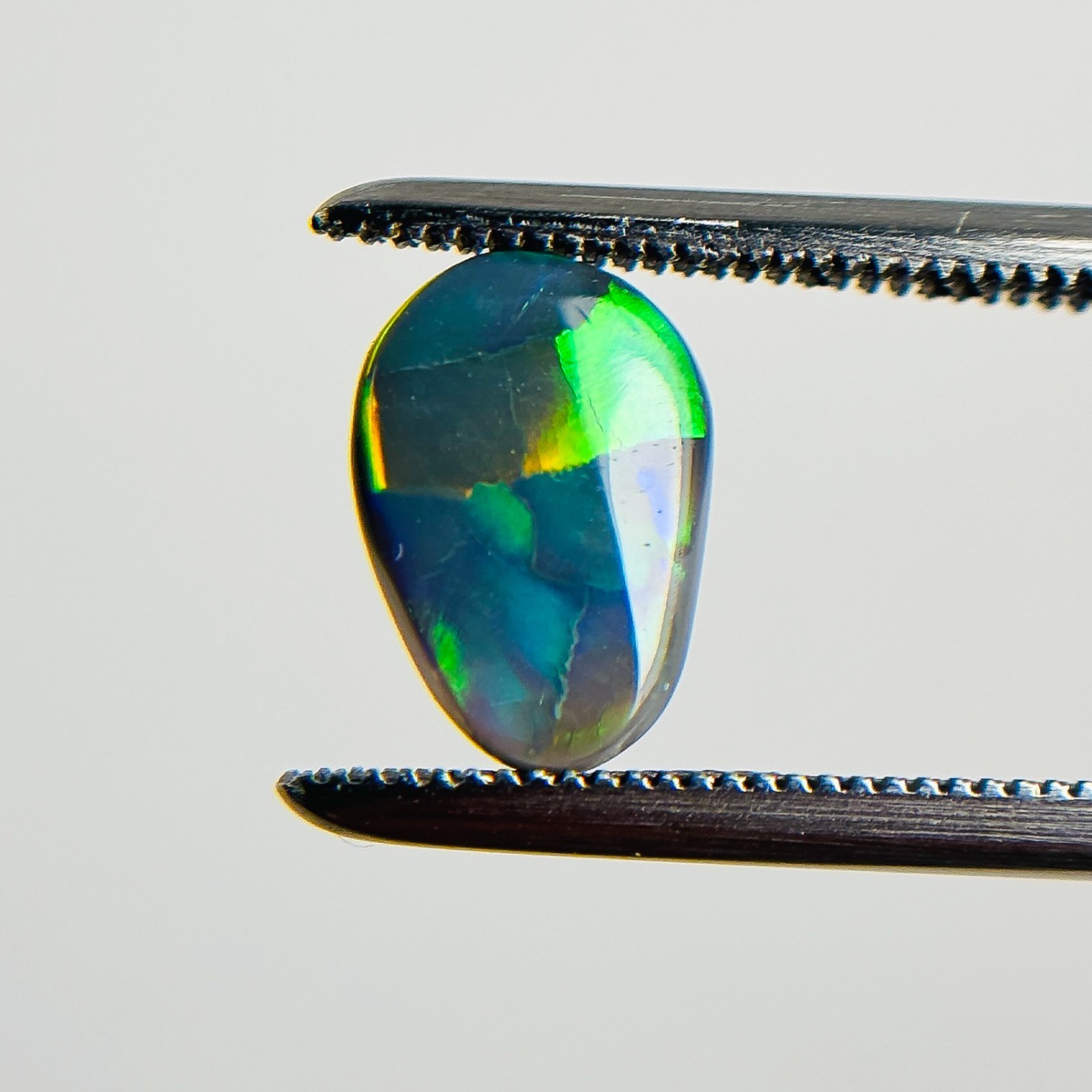 Semi Black Opal Multicolour 9x6x2.2 Cabochon Pear 0.9 Carat OPAL137