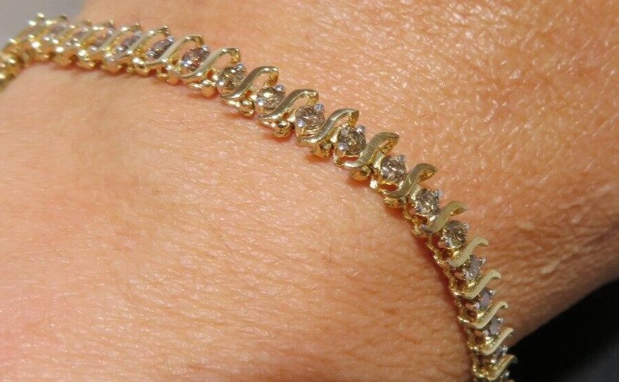 10K LADIES DIAMOND TENNIS BRACELET 1.00 tcw 7″ LONG 4.49 MM WIDE 6.42g(6132597-9