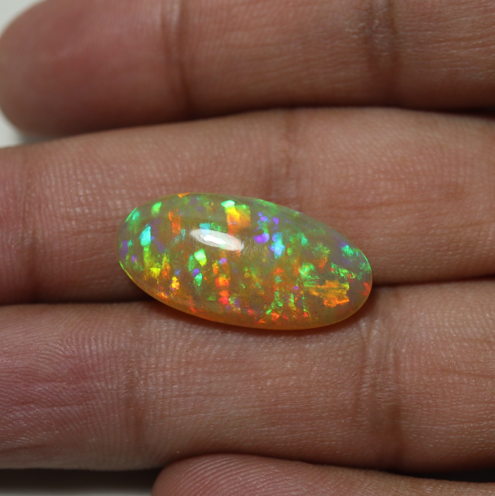 8.8Cts Natural AAA Ethiopian Opal Oval Flashy Rainbow Fire Cabochon 23.1×11.8 MM