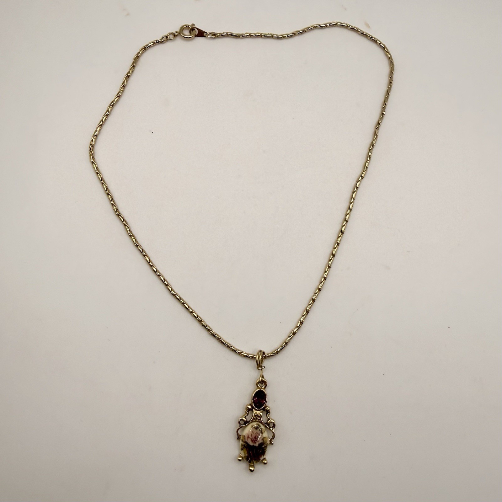 Vintage 1928 Gold Tone Rose Pendant Necklace Amethyst Purple Rhinestone