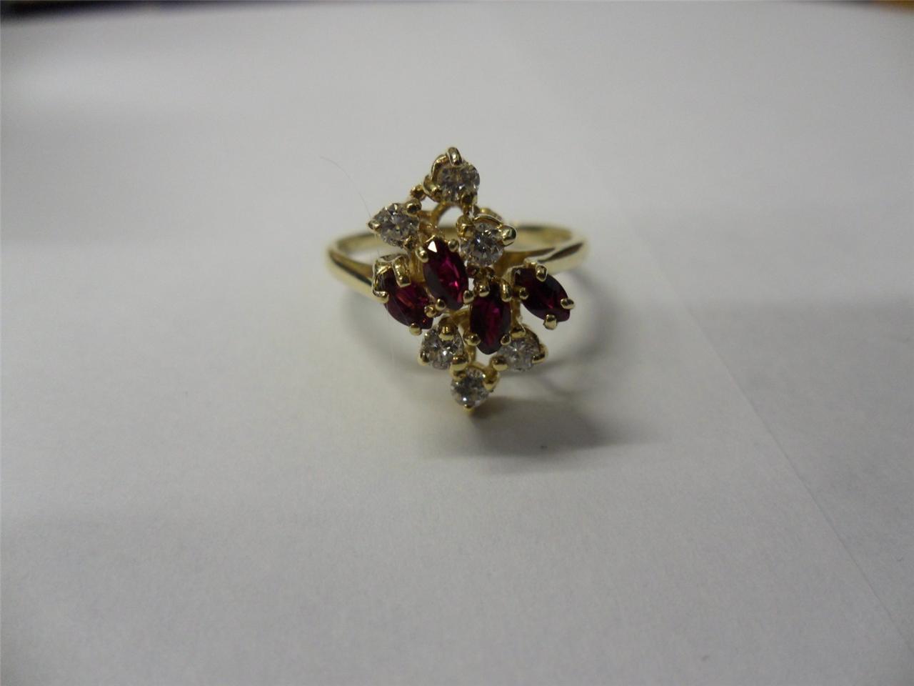 14K BEAUTIFUL LADIES /MARQUISE RUBY/DIAMOND/CLUSTER RING SIZE 6.5(3.26 GRAMS).