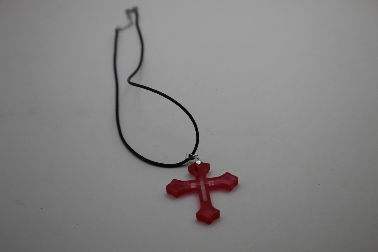 Simple Bright Red Resin Cross Pendant On A Cord