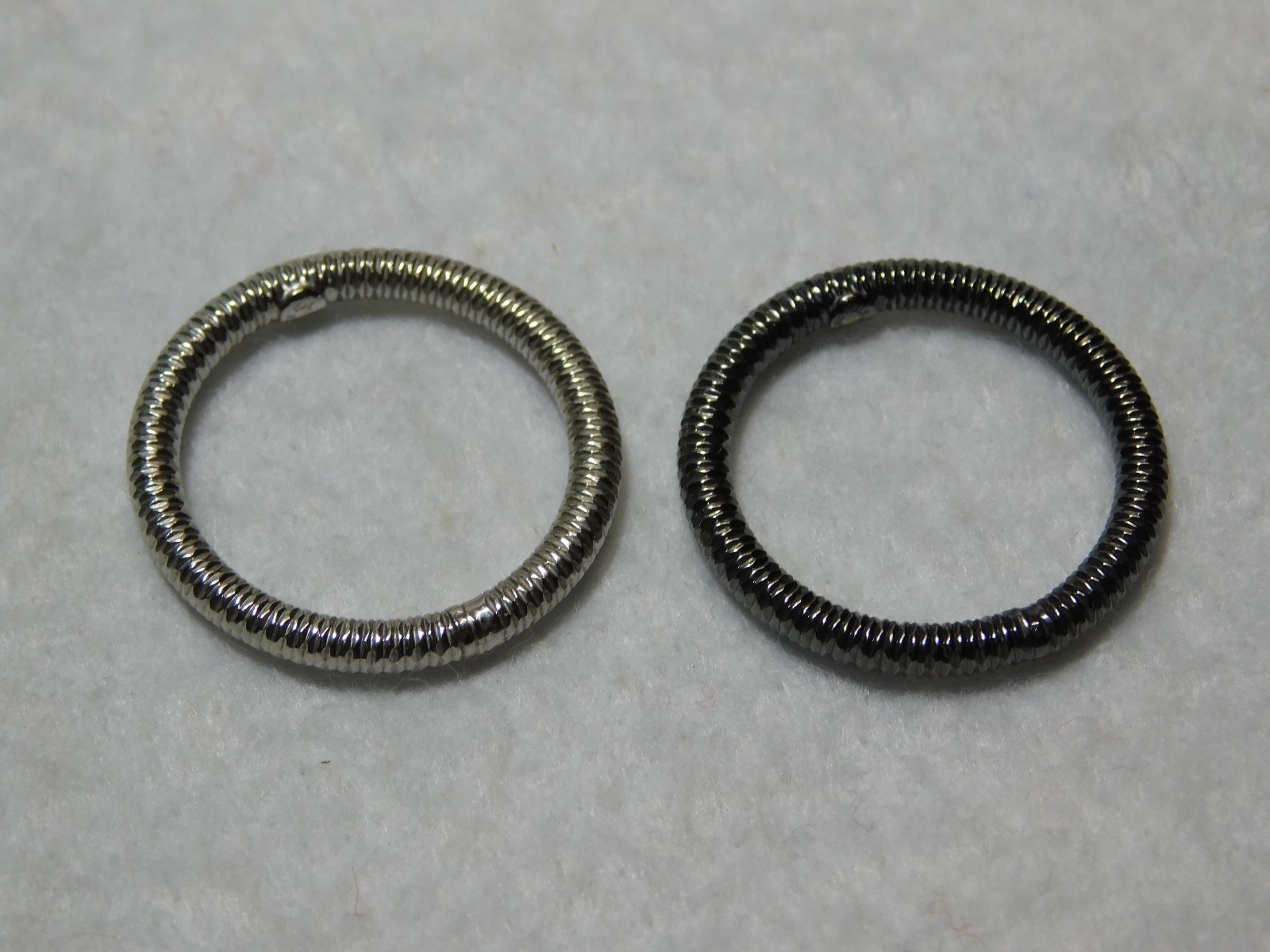 Pair of Sterling Silver, Made in Italy Plain Band Rings. Size 9.5 in Good Cond.