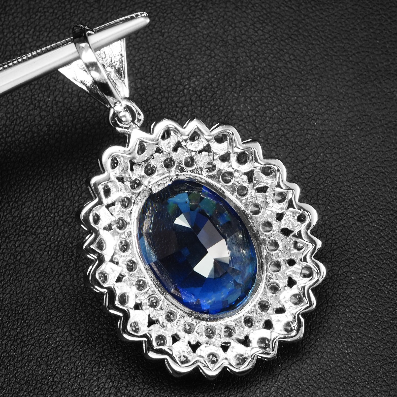 Opulent Intense Blue Sapphire 28.15Ct 925 Sterling Silver White Gold Pendants