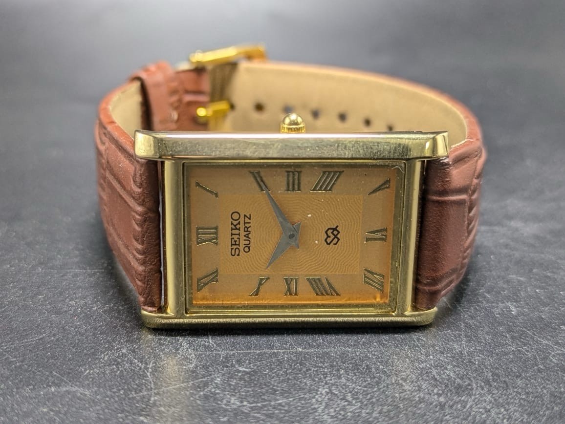 Seiko Quartz Rectangular Green Dial Black Band Roman Numerals Men’s Watch