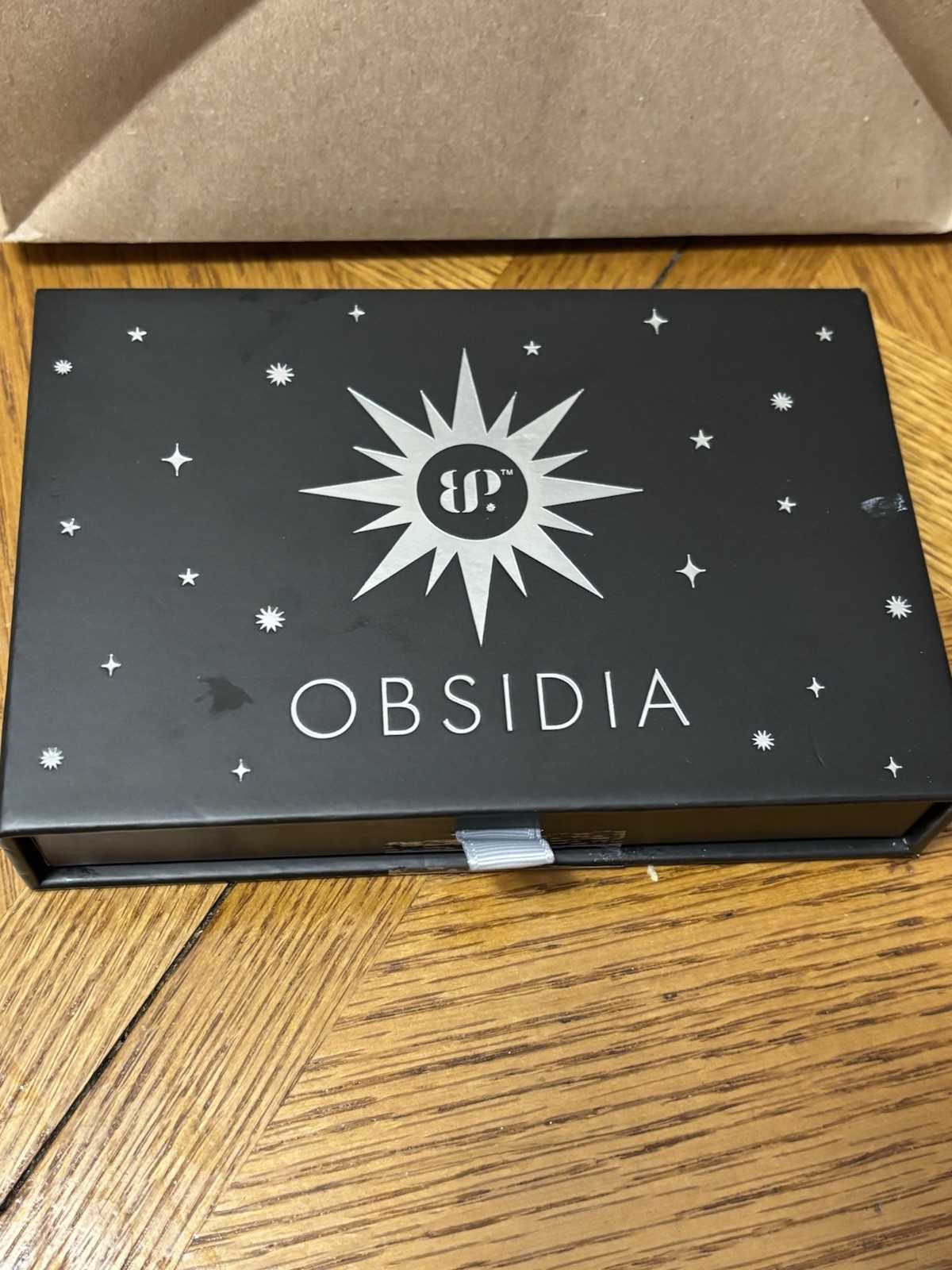 Bomb Party Obsidia “Stardust Falls” Rhodium Plated Onyx Sandstone