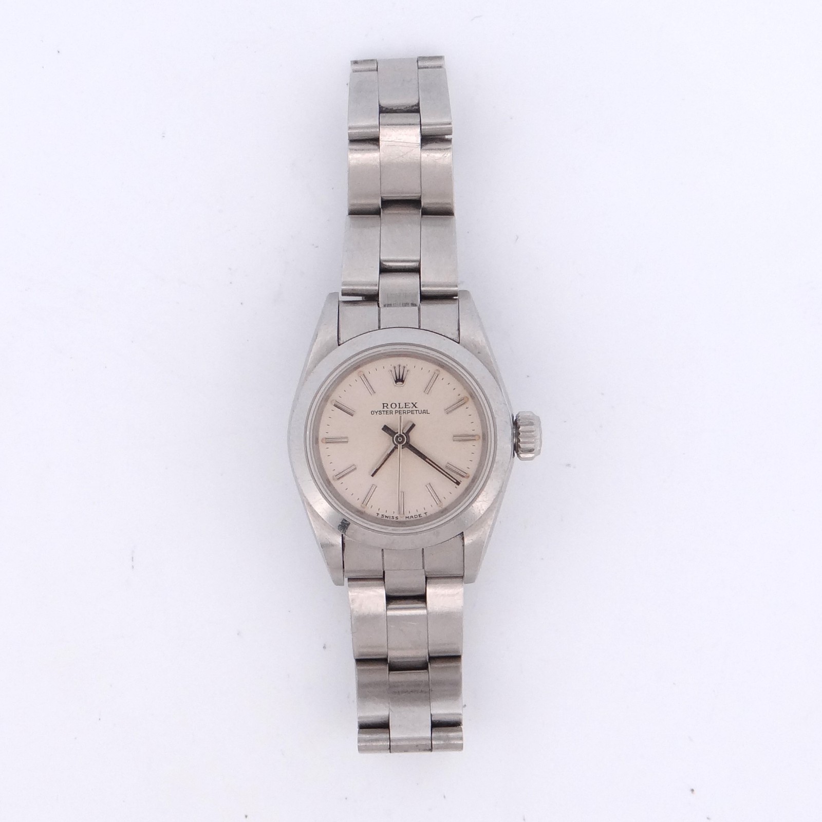 Rolex 67180 Ladies Oyster Perpetual Silver Stick Dial Smooth Bezel Oyster Watch