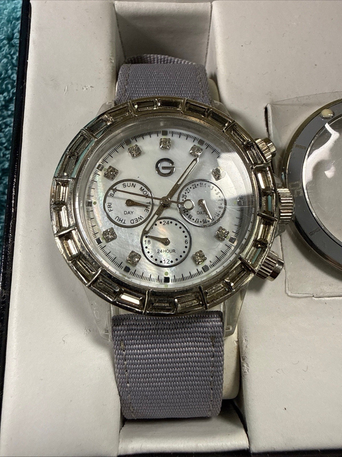 Gossip Gray Dial Bezel Crystal Accent Round Clear Case Gray Canvas Band Watch