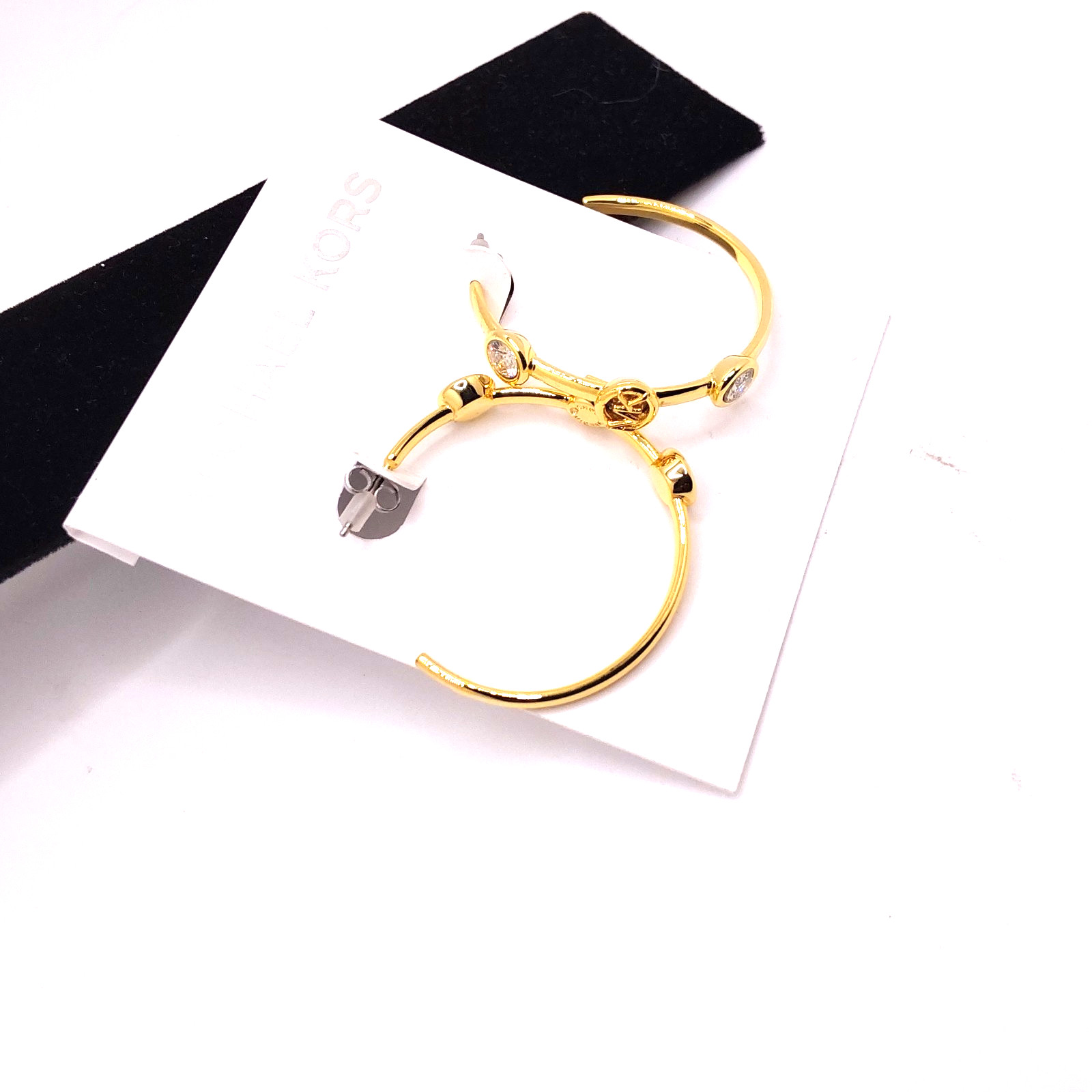 Michael Kors Evelyn Gold Tone Medium Open Hoop Earrings