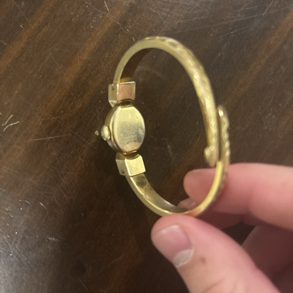 Bucherer gold vintage watch -receipt and warranty card. 20 micron gold plated