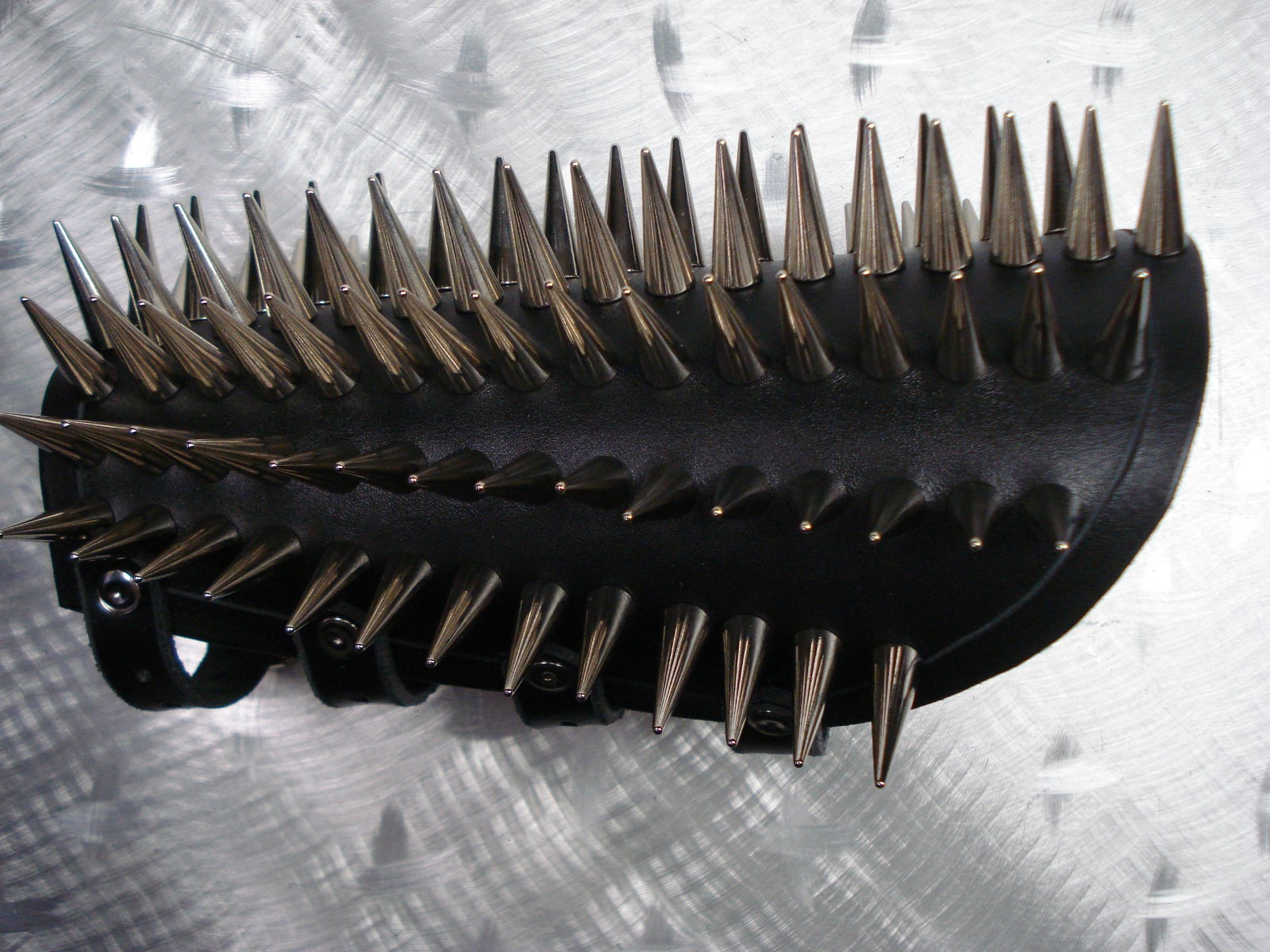LEATHER SPIKED CONE GAUNTLET. BLACK METAL… (MDLG0231)….. BEHEXEN