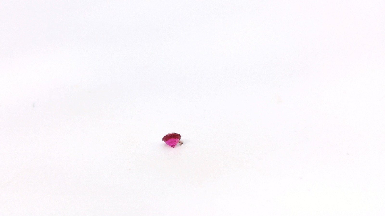 0.09ct Round Cut Lab Created Ruby Gemstone 2.7 x 1.9 mm