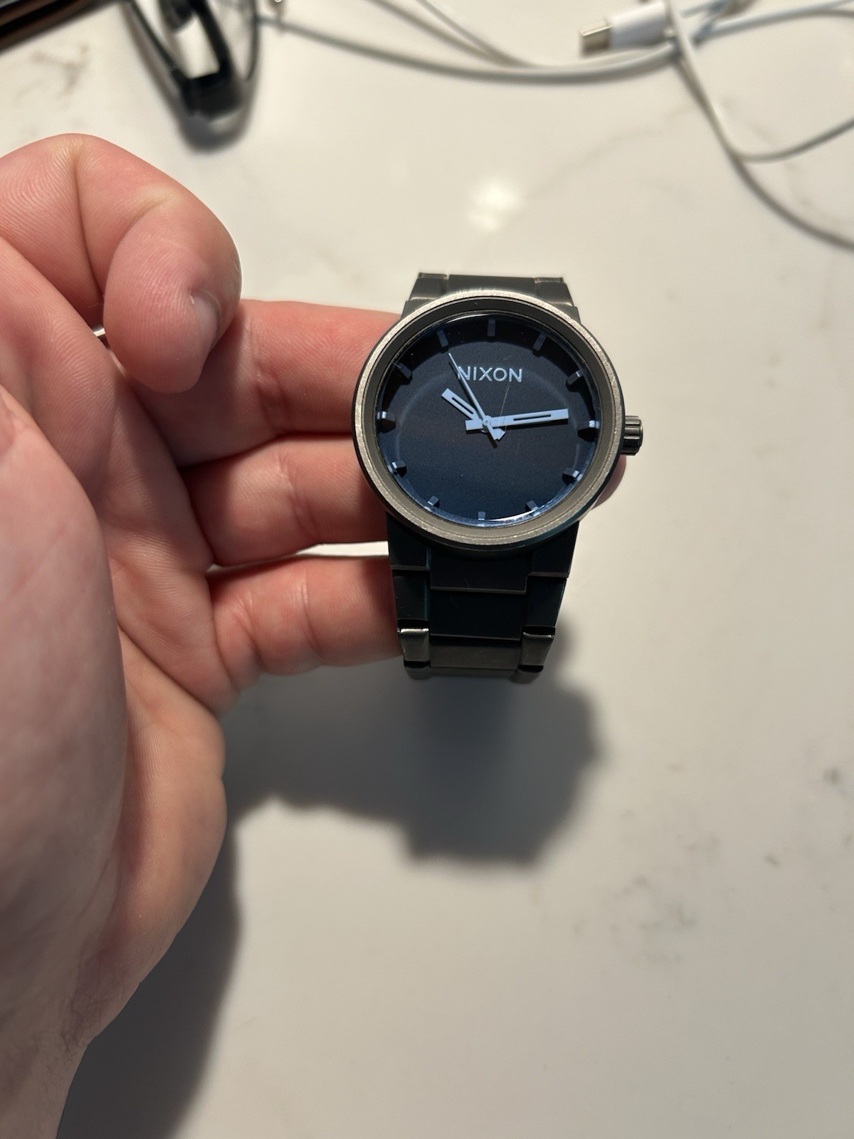 Nixon Cannon Quartz Wristwatch Black Metal Bracelet Round Blue Dial Fixed Bezel
