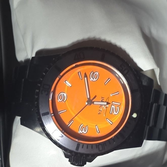 Invicta Men’s Quartz Analog Wristwatch 100m 44-47.9mm Orange Dial Black