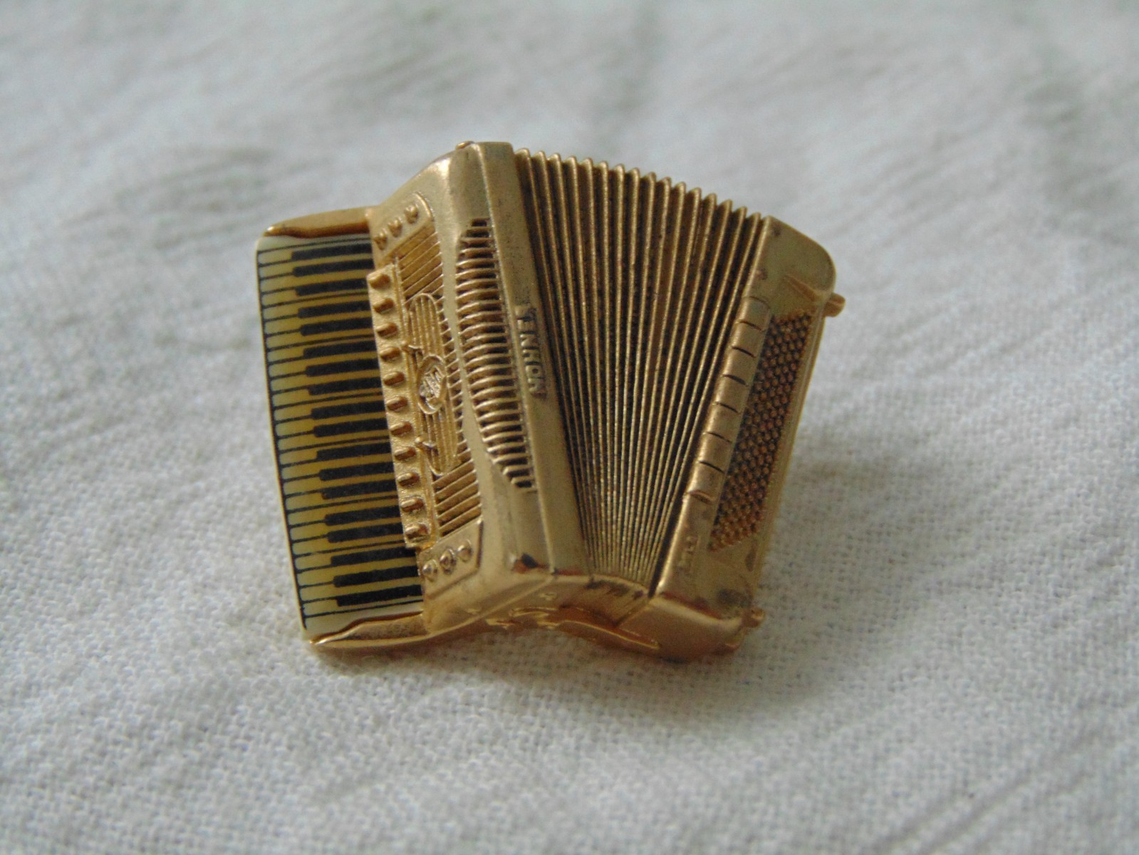 vtg Future Primitives U.S.A signed Acordian pin