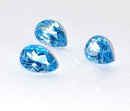 Topaz Swiss Blue 9 x7 mmm Pear shaped stones set of 3 approx 25 carats
