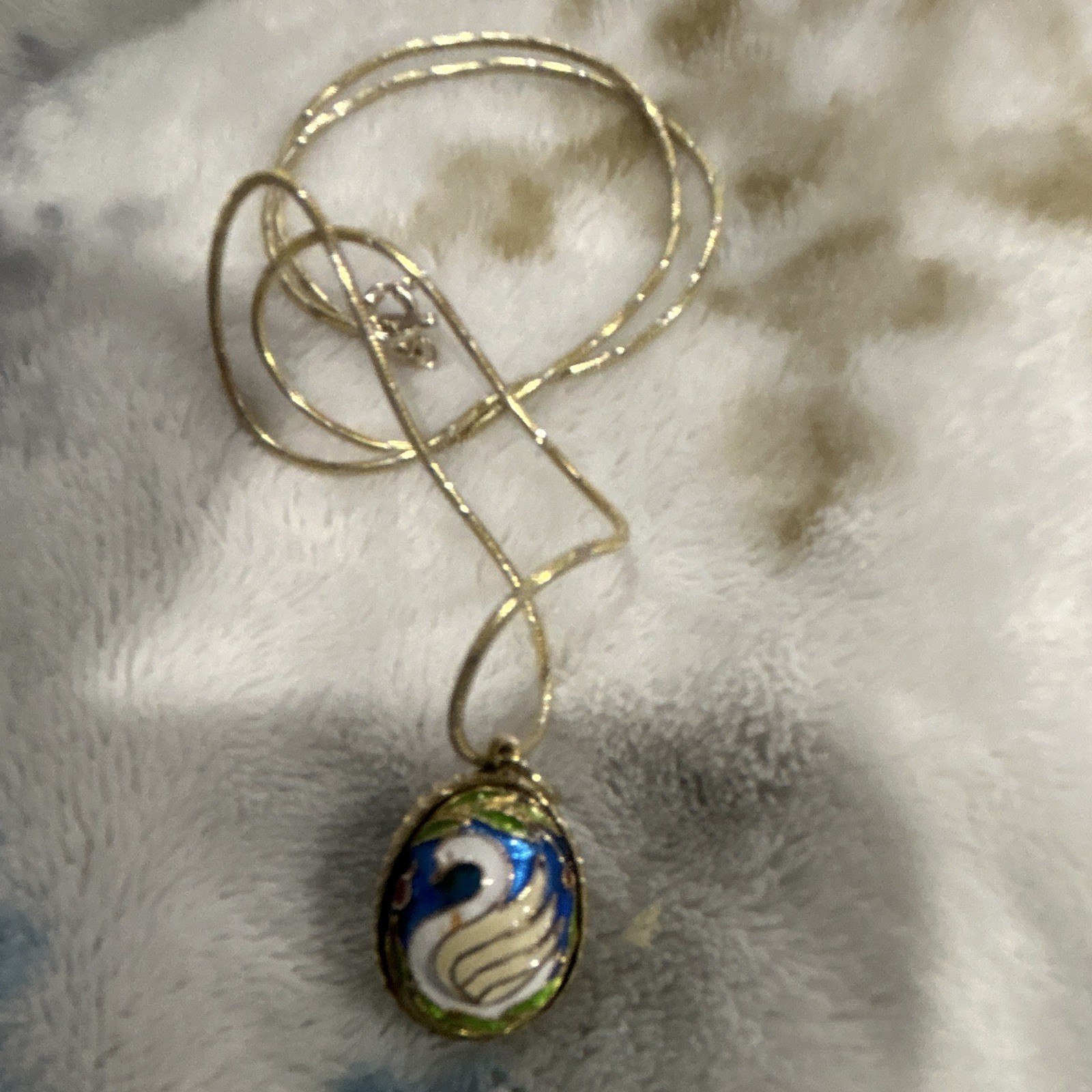 Russian Cloisonné enamel Swan egg pendant and chain stamped Italy .