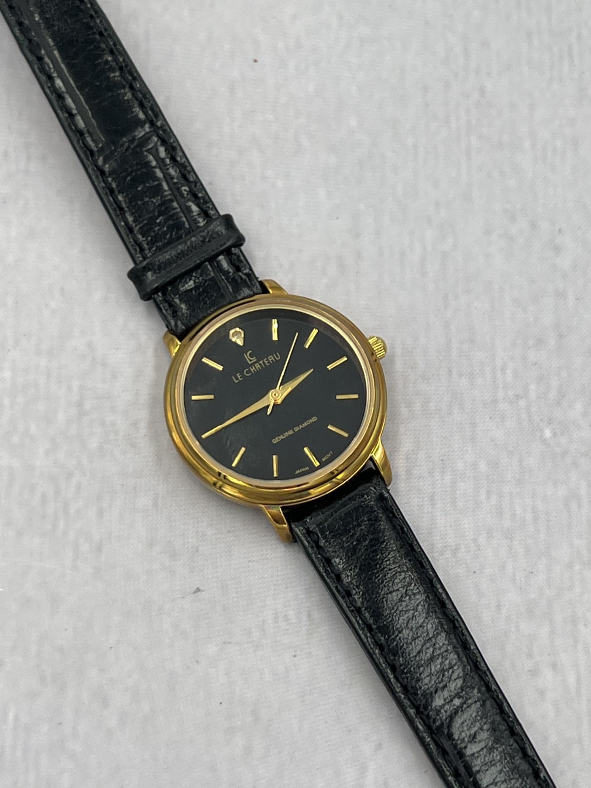 Le Chateau Women’s Black Leather Band Black Dial Genuine Diamond Dress Watch