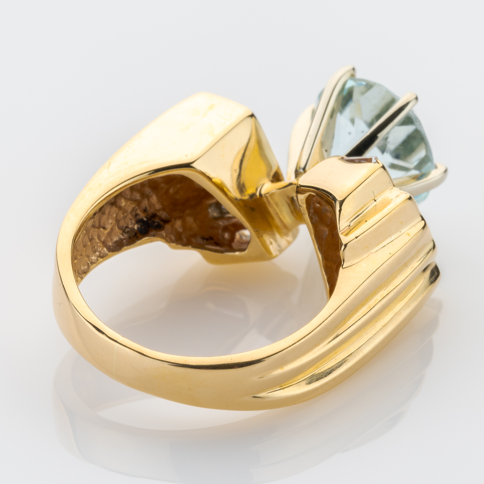 14k gold ring with an aquamarine and diamonds