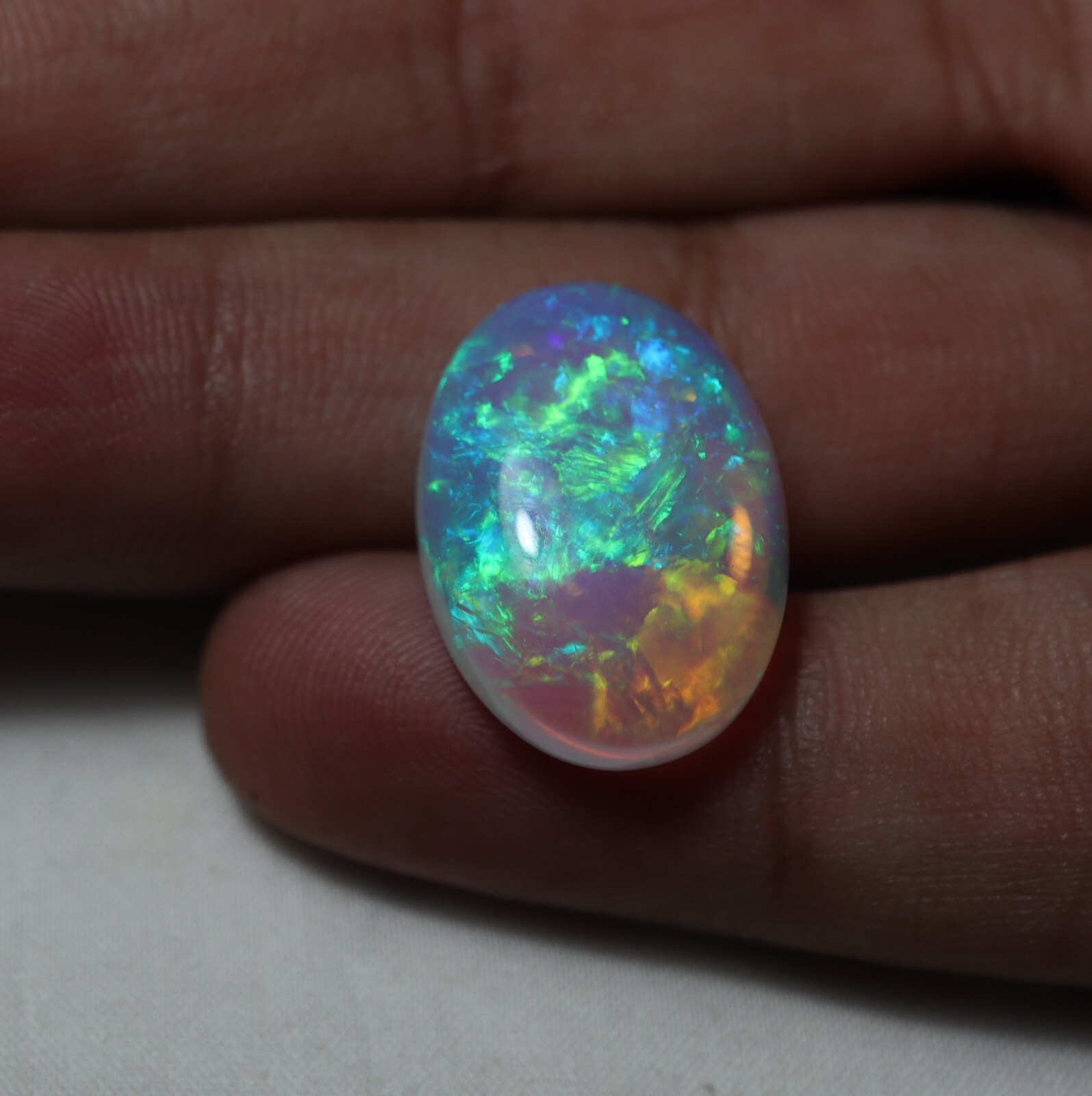 12.1 Ct 21.3×15.4 MM Natural AAA+ Multi Flashy Fire Ethiopian Opal Oval Cabochon