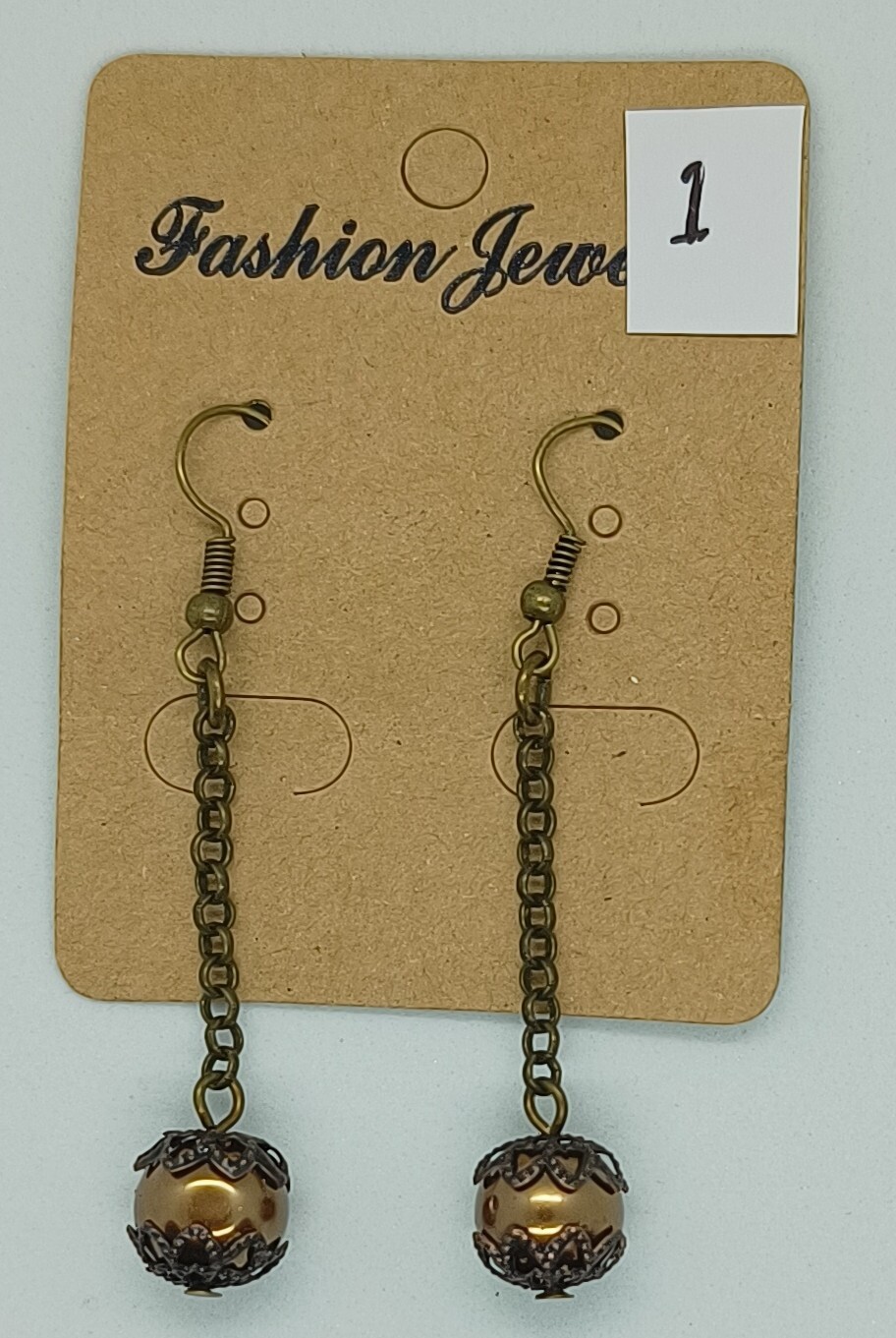 DROP DANGLE EARRINGS . ASSORTED SHADES. APPROX 60MM DROP. HOOK FITTING. NEW