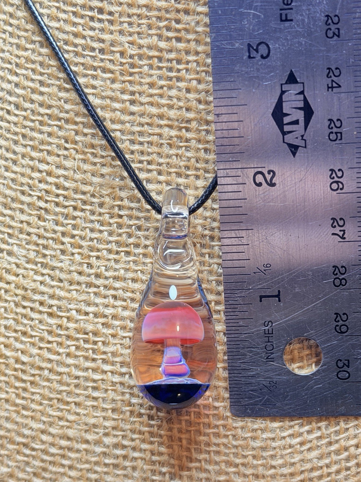 Glass Teardrop Mushroom Pendant in reds and purples with cobalt blue base