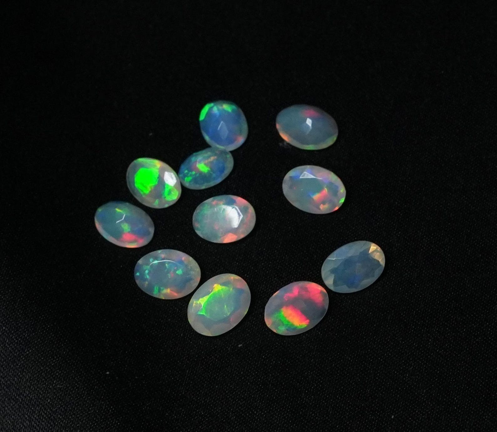 Natural Rainbow Ethopian Opal Oval Faceted Cut 3x5mm To 8x10mm Loose Gemstone