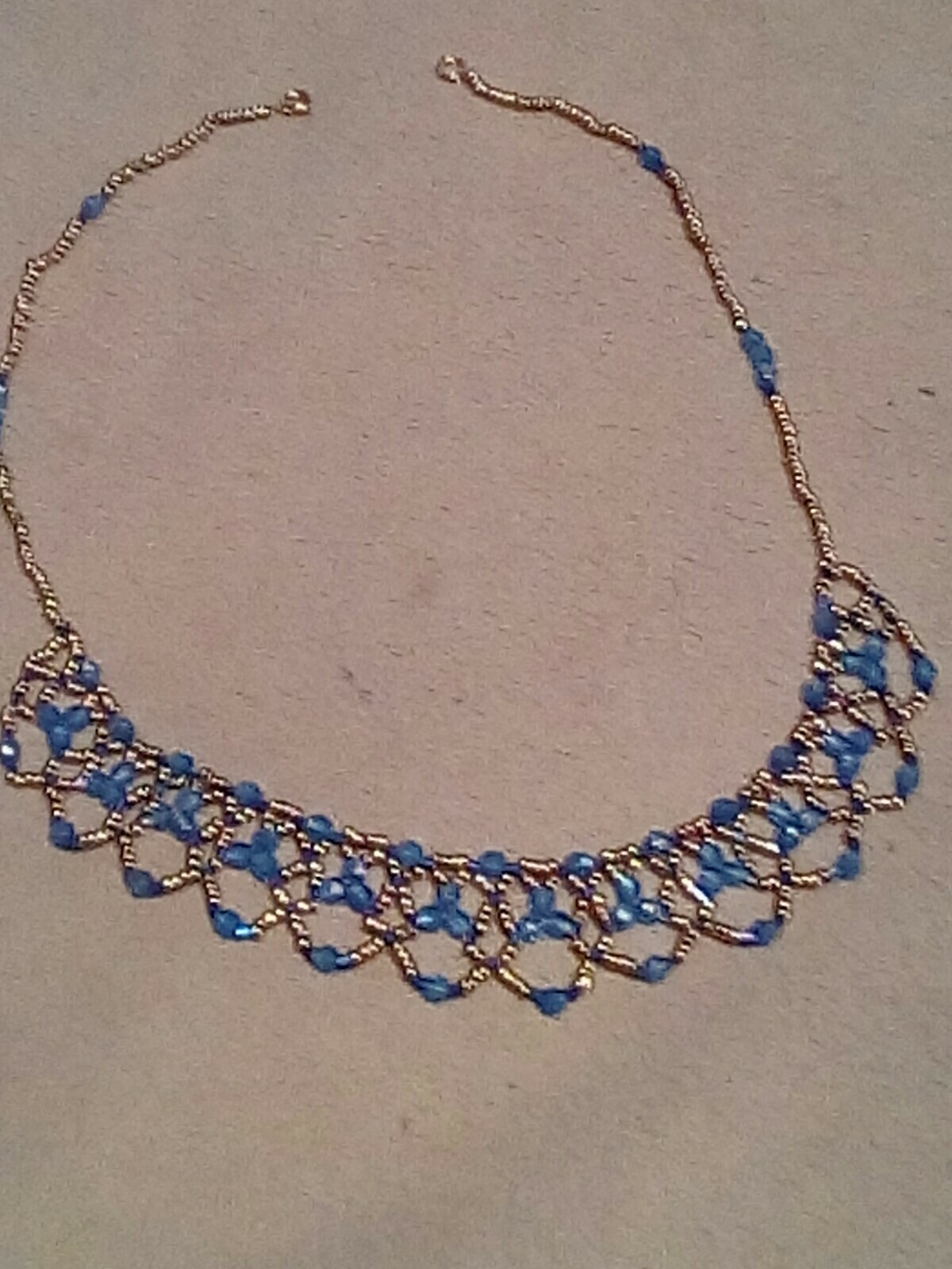 Hand Beaded necklace gold and blue 19 1/2 inches
