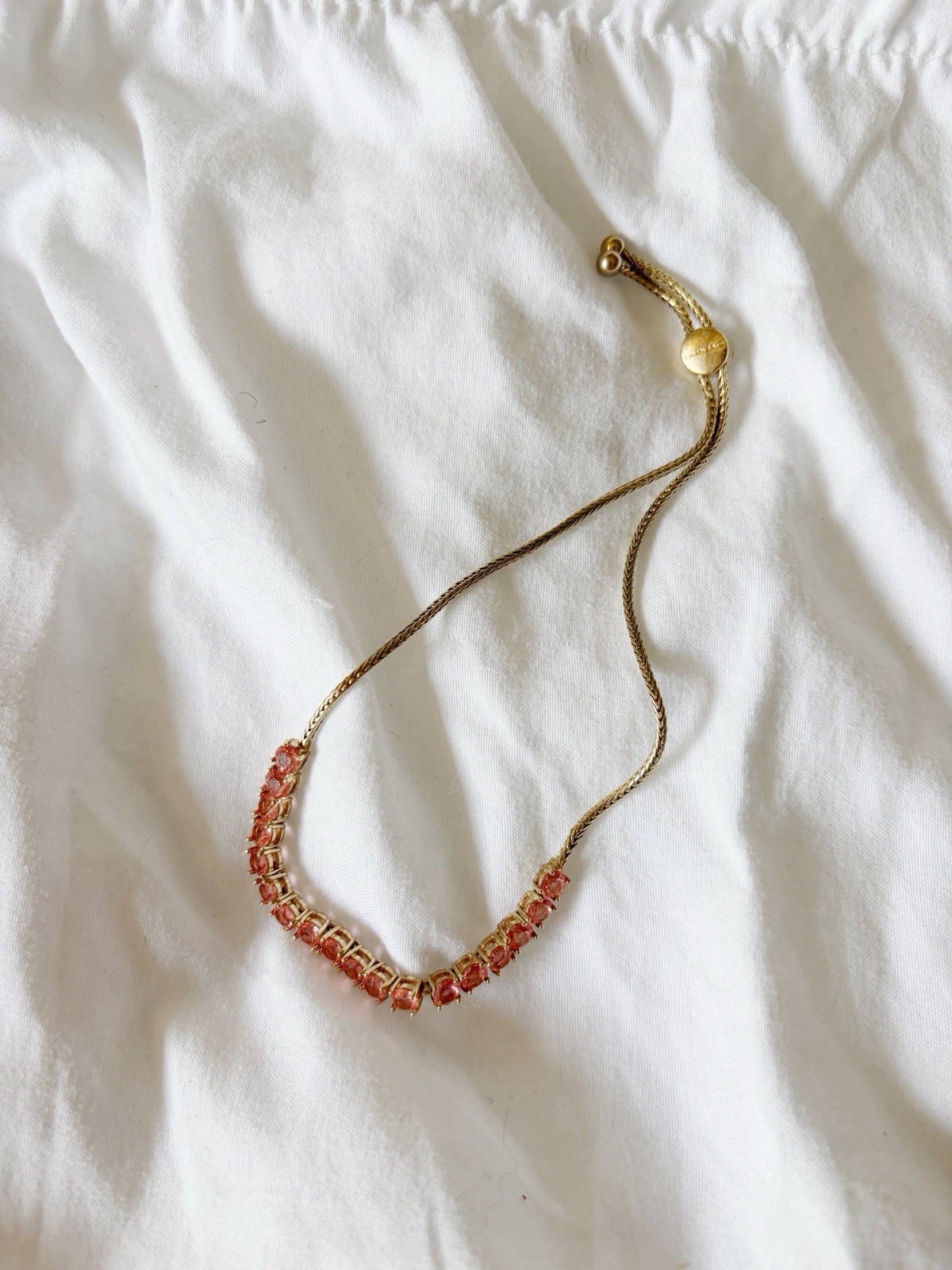GIVENCHY Gold-Tone Pink Crystal Adjustable Slider Bracelet