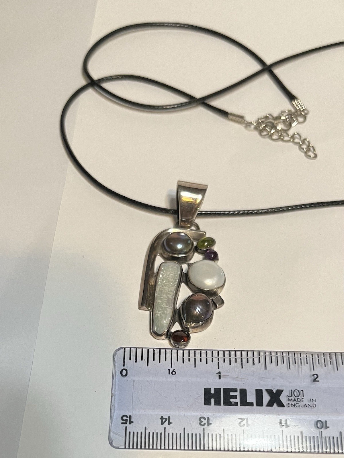 vintage style multi gem sterling silver pendant on 24 inch long black cord.new