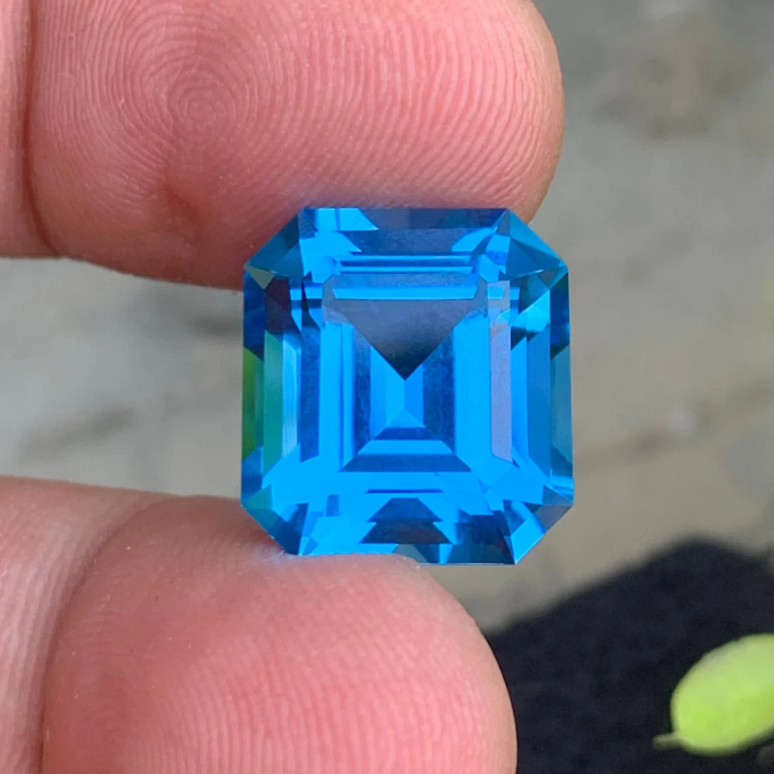 16.70carat Natural Electric Swiss Blue Topaz With emerald cut origin from Afric