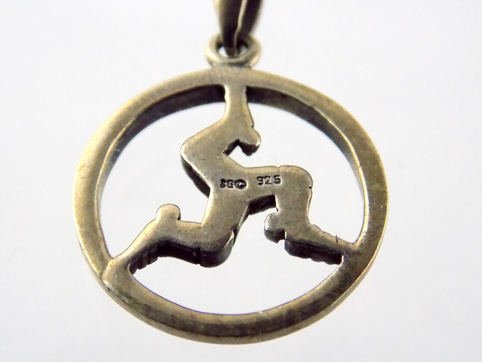 SG Sterling Silver Triple Leg Running Pendant Symbol 3.2 Grams 925