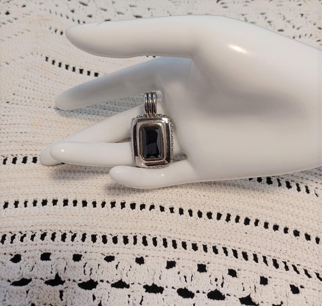 Black Faceted Glass and Silver Tone Pendant