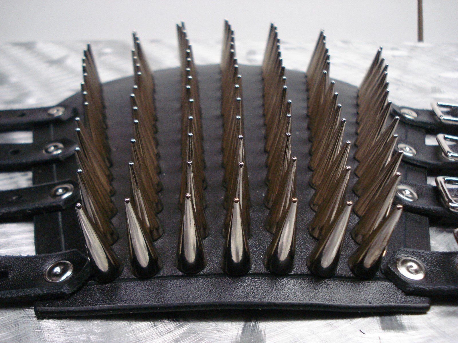LEATHER SPIKED CONE GAUNTLET. BLACK METAL… (MDLG0231)….. BEHEXEN