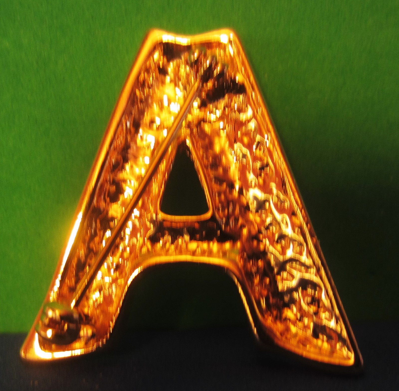 Un-marked Gold-tone A Shaped Pin/Brooch 1 1/4″ by 1 1/4″