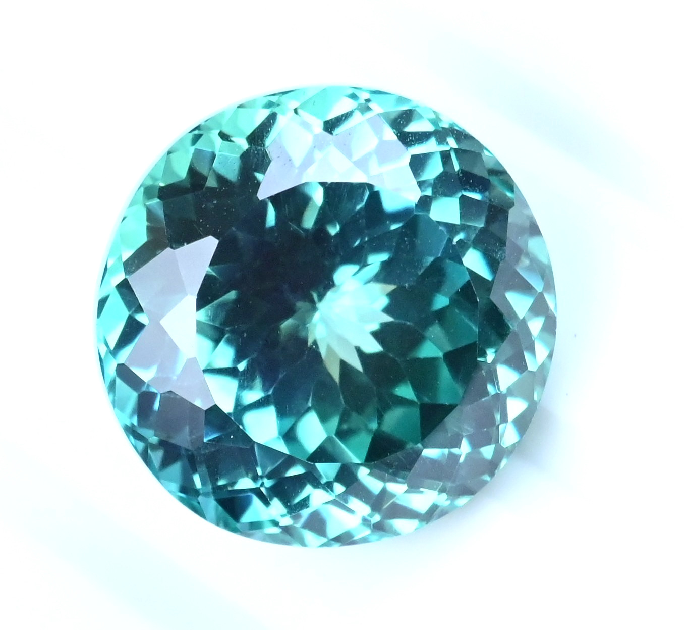 26.75 Ct Natural Green-Blue Serendibite Certified Flawless Round Loose Gemstone